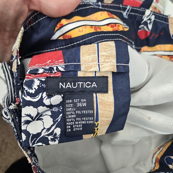 Nautica Blue and Red Swim Trunks with Surfboard Design - Picture 5 of 6